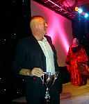 Peter Guttridge collects the cup.jpg